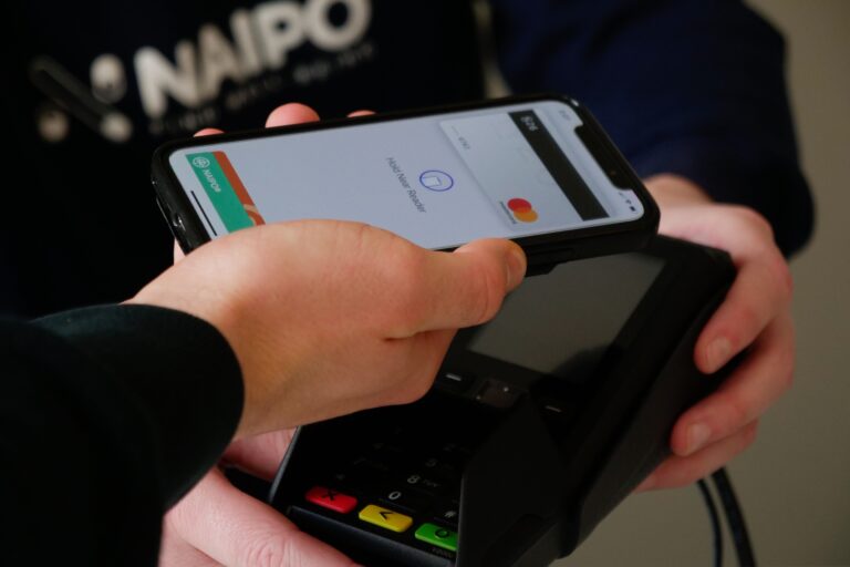 A person paying with a digital card.